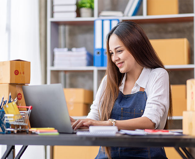 A store owner reviewing her website security using American PaySave POS systems 
